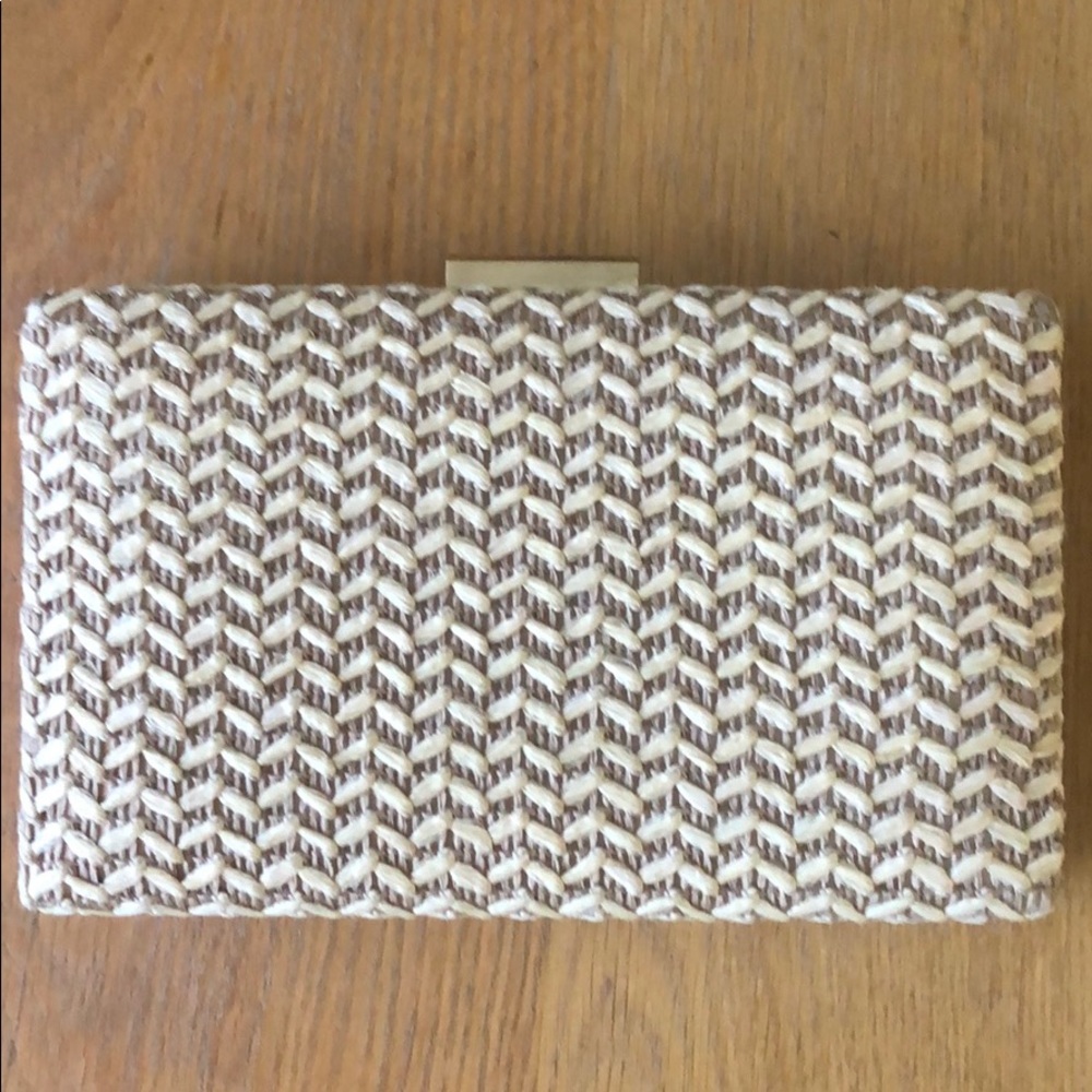 Raffia and gold clutch